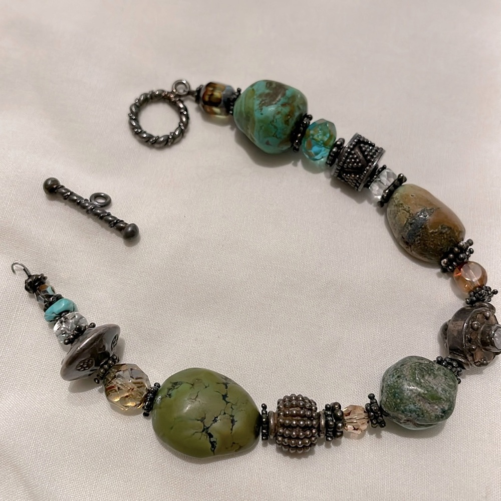 Bracelet with stones and beads.